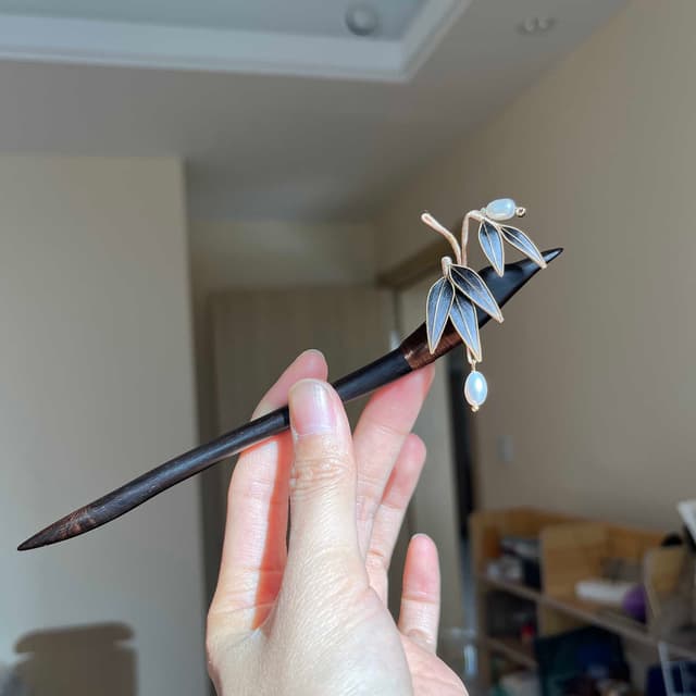 Bamboo Shadow — Velvet Leaf Pin — the piece resting in soft light