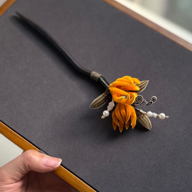 Buddha’s Hand — Fine Velvet Hairpin — the piece resting in soft light