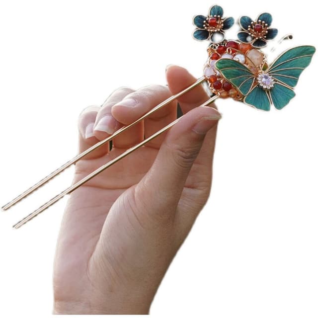 Butterfly in Love — Kingfisher-Blue Double-Prong Pin — the piece resting in soft light