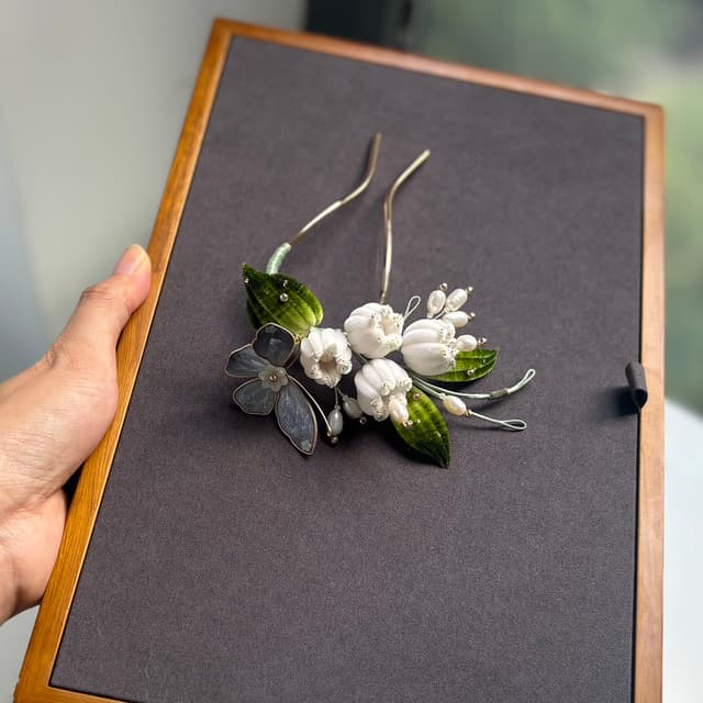 Lily of the Valley — Plush Velvet Hairpin — the piece resting in soft light