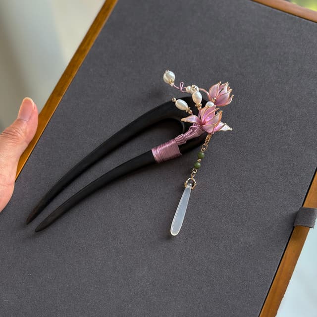 Jade Beauty — Magnolia Double Ebony Hairpin — the piece resting in soft light