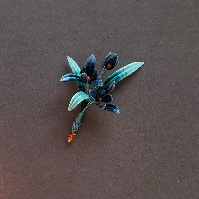 Orchid Heart — Blue-and-White Porcelain Brooch — worn as part of a styling